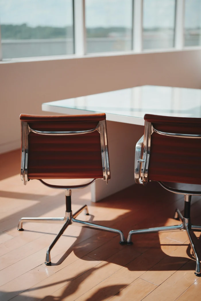 Sunlight across a modern meeting table